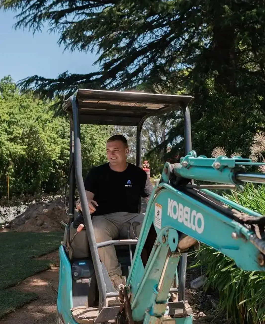 Steven Seery from Pro-Line on a mini excavator during drainage works